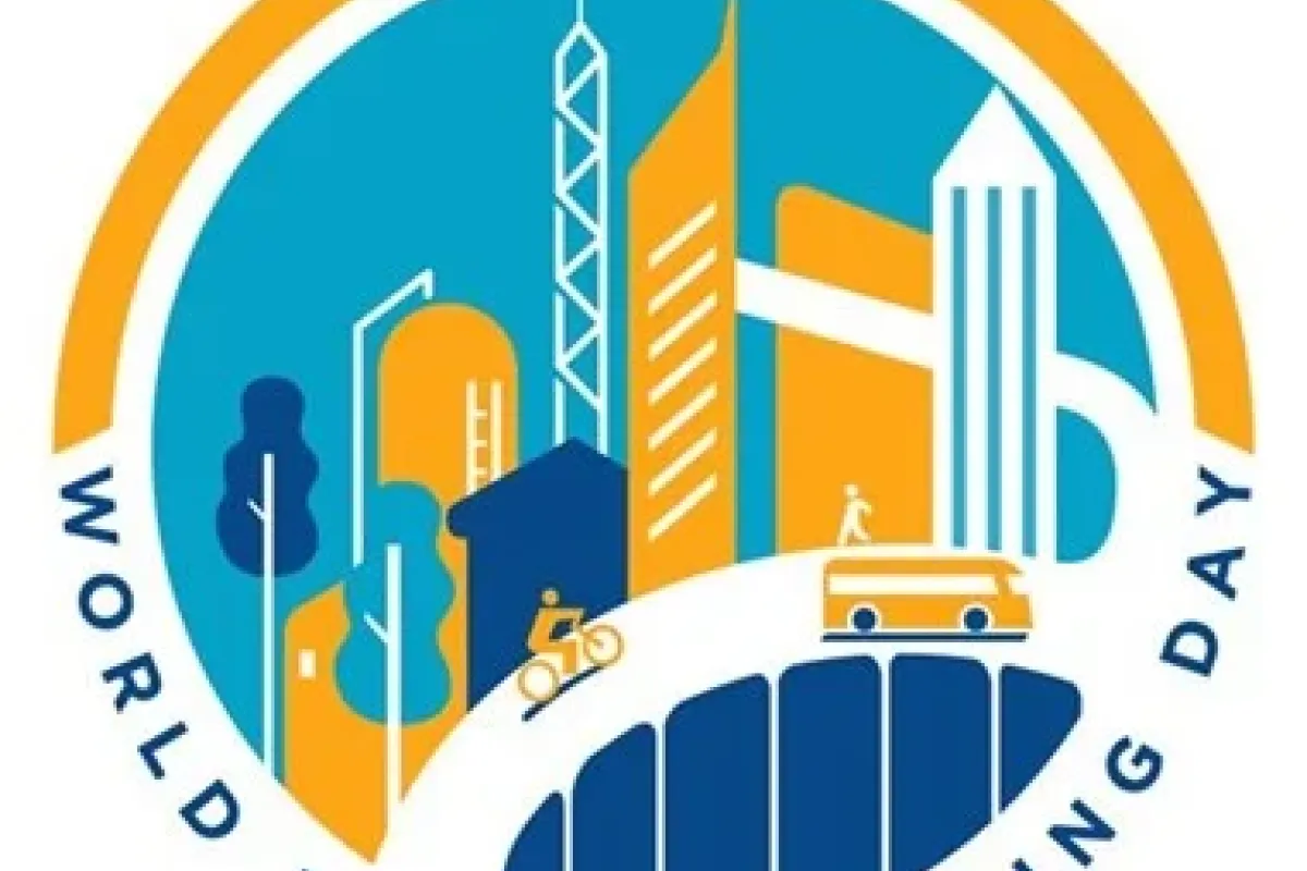 World Town Planning day logo showing cartoon buildings in orange and blue