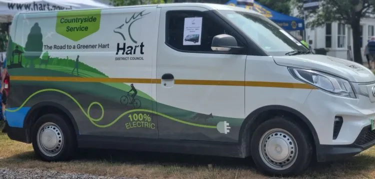 Countryside Service white electric van with Hart District logo and image of countryside on side of van