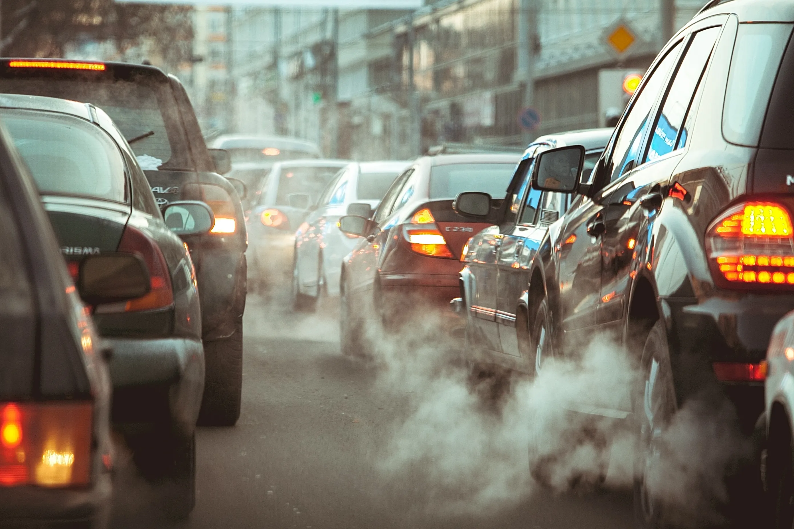 Cars in a traffic jam with fumes